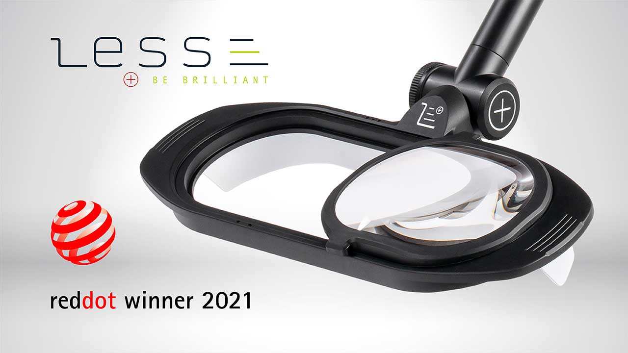 Logo of the Reddot winner 2021 won by L.E.S.S. SA with a picture of close-up on the head of the lamp made by L.E.S.S. SA.